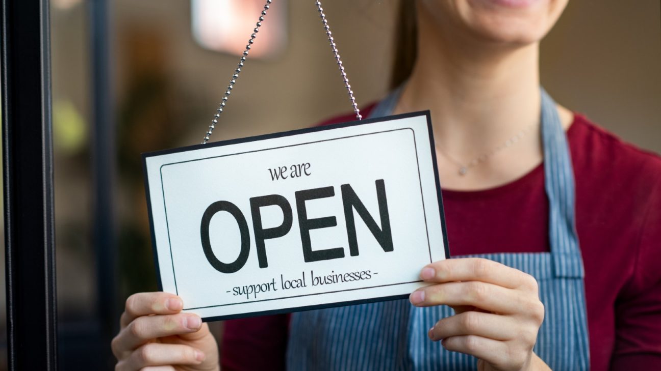 How to register your business: Open sign at a cafe