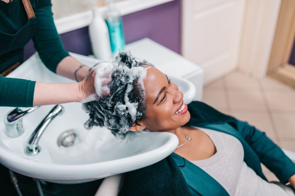 business plan for a hair stylist Salon business plan: Happy customer getting hair washed