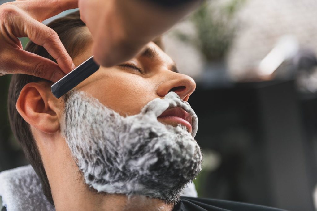 Barbershop business plans: Close-up of a beard shave