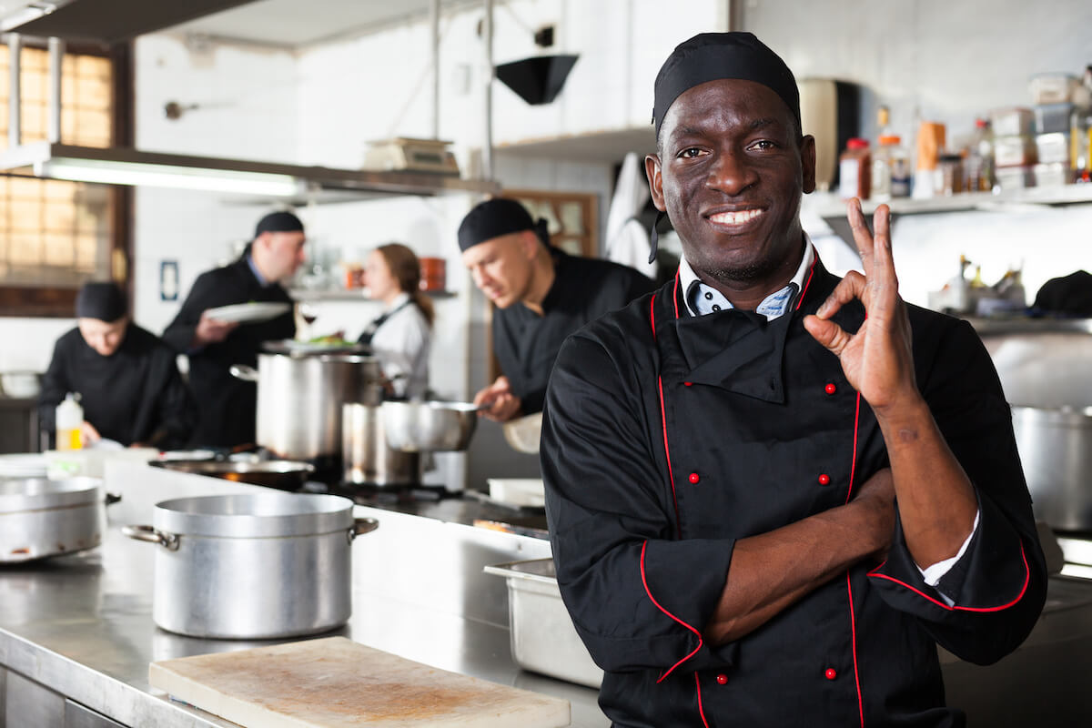 Restaurant standards: Chef making an "OK" gesture with hand