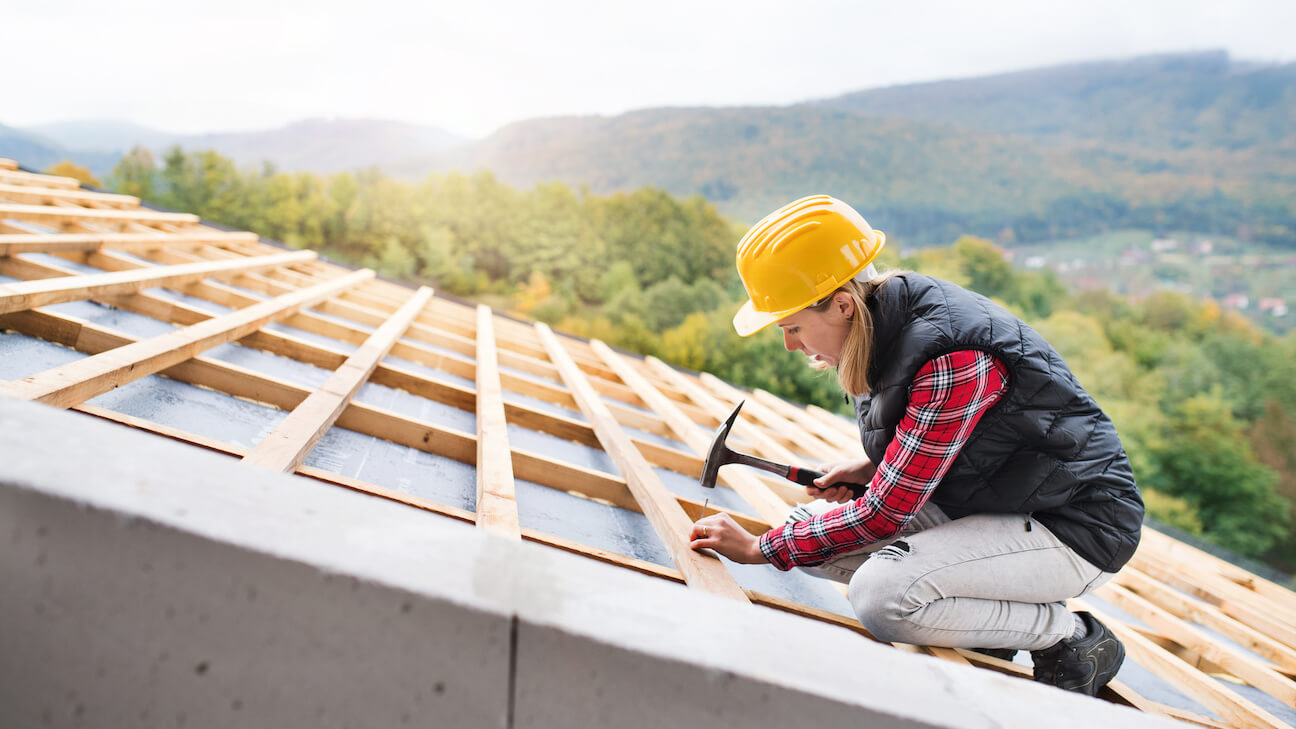 https://business.yelp.com/wp-content/uploads/2022/10/lp-ban-construction-worker-using-a-hammer.jpeg