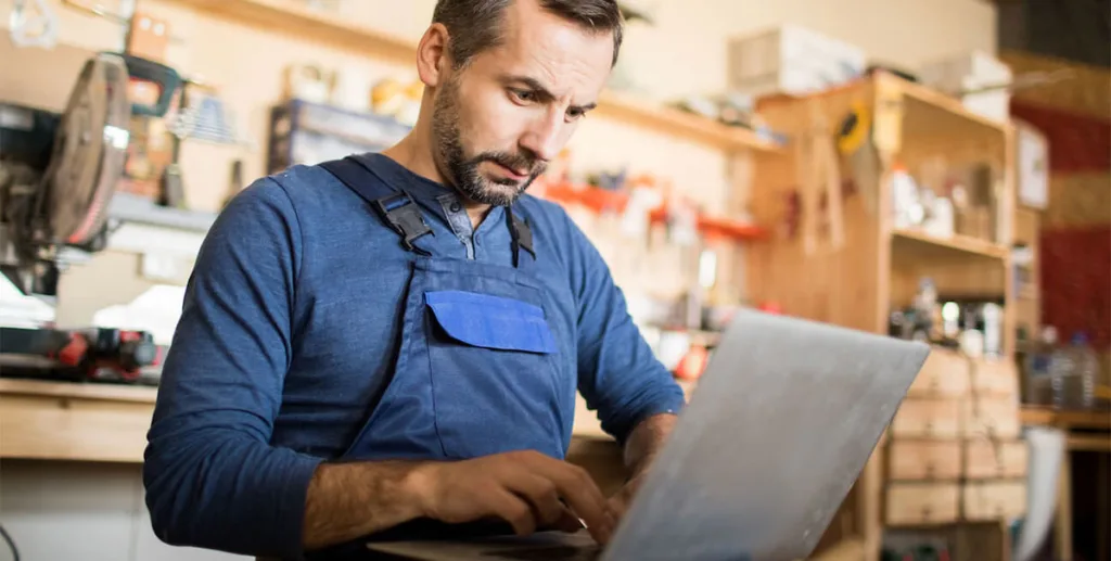 Online reputation: owner using a laptop