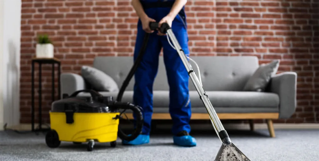 Carpet cleaning leads: carpet cleaning business owner cleaning a house