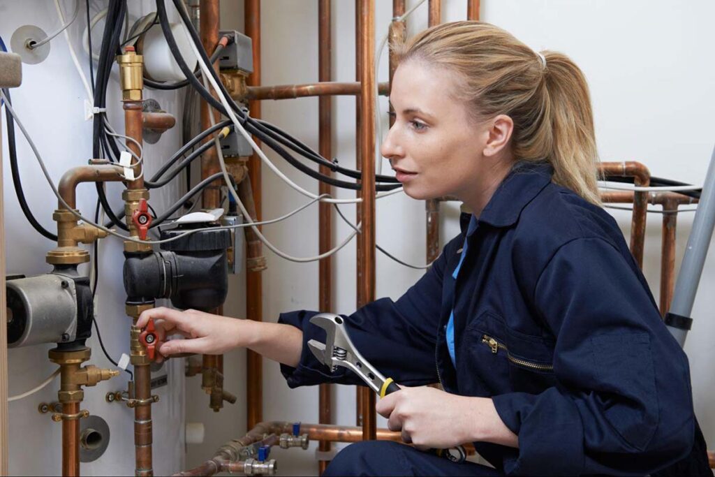 SEO for plumbers: woman plumbing business owner