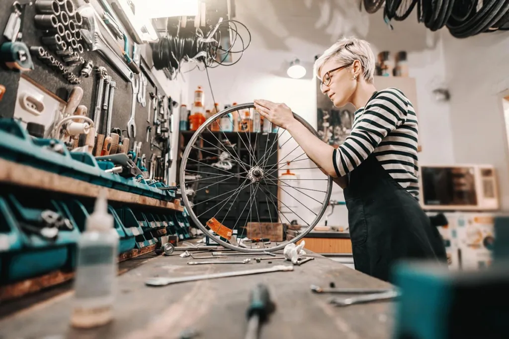 Bike mechanic in repair shop