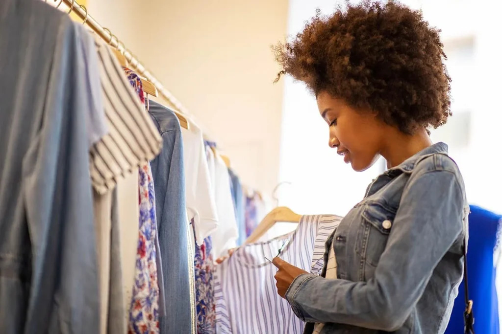 Types of pricing strategies: Woman shopping for clothes