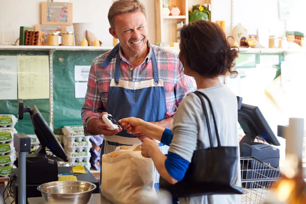 Customer paying using her credit card