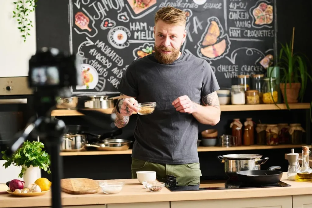 A restaurant owner filming a video ad