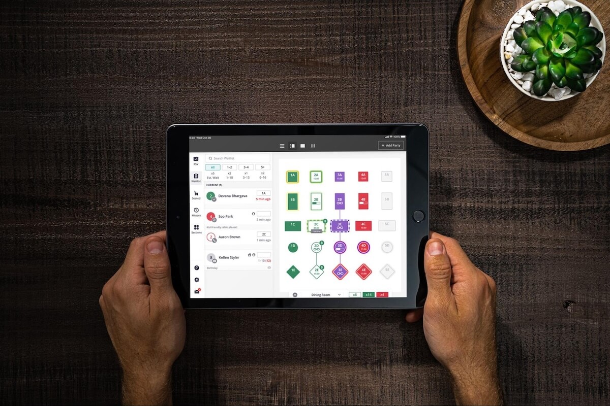 Employee using a POS system