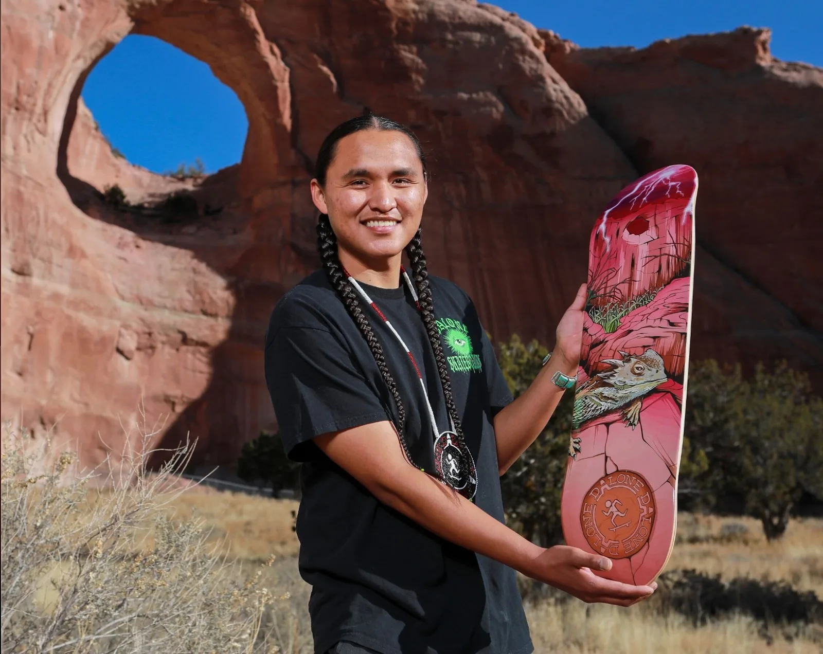 Jerome holding the Cheii skateboard