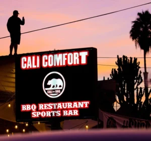 Photo of Shawn Walchef filming content on the roof of Cali Comfort from Cali BBQ Media