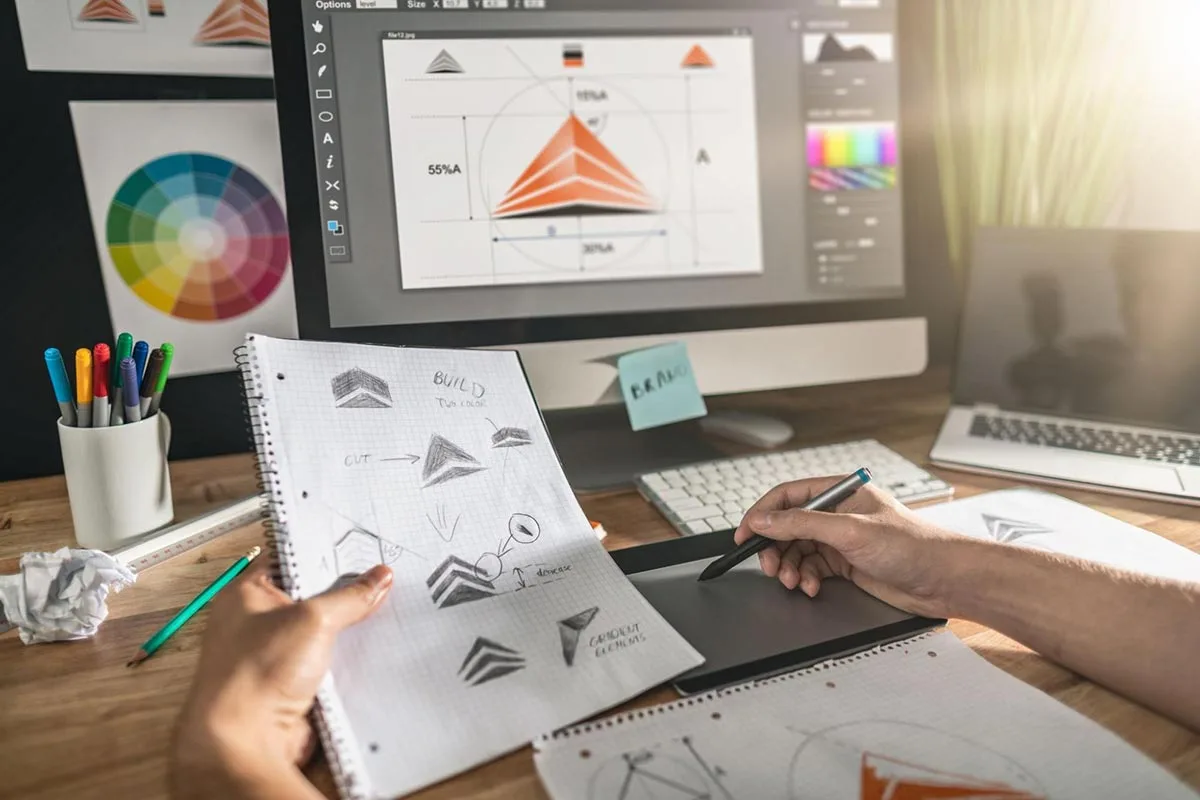 A designer working with graphic icons.