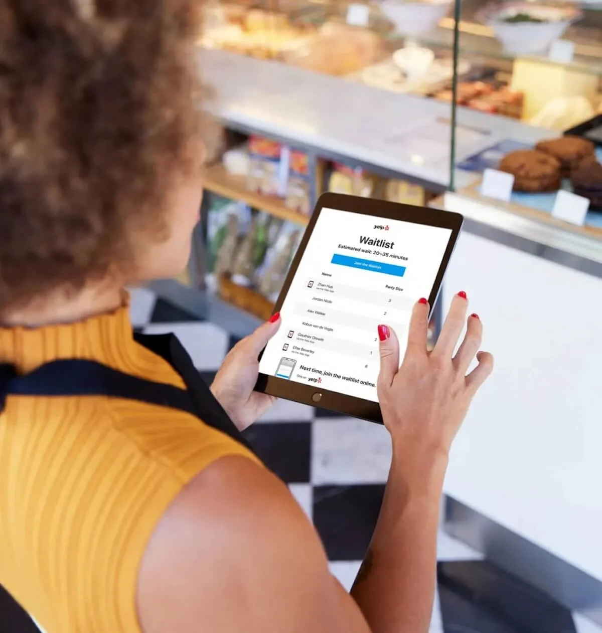 Waiter using a tablet
