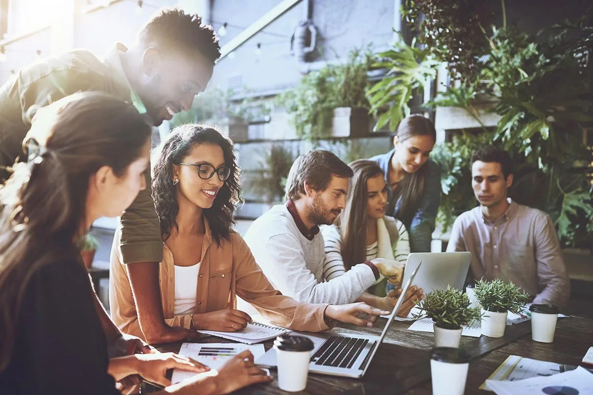 A group of local business owners gather together for a meeting.